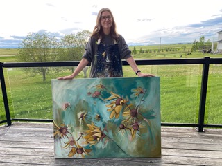 Rachelle Kearl with her painting